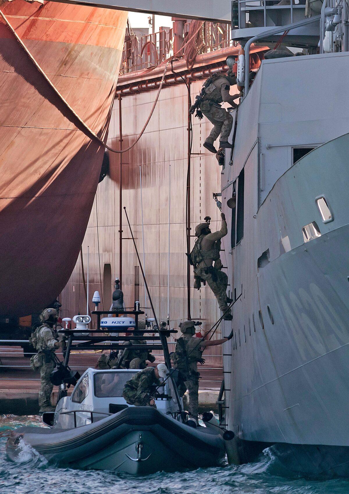 Navy SEALs participate in a joint rescue exercise with Cypriot Navy special forces in Limassol, Cyprus, on Sept. 10, 2021. (Iakovos Hatzistavrou/AFP via Getty Images)