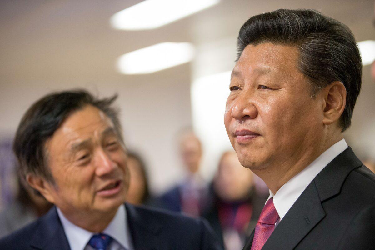 Chinese leader Xi Jinping (R) is shown around the offices of Chinese telecom giant Huawei by its president and founder Ren Zhengfei in London during Xi's state visit to the UK on Oct. 21, 2015. (Matthew Lloyd/AFP via Getty Images)