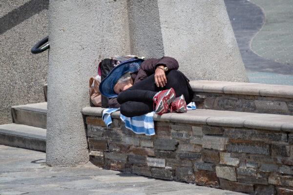 A homeless individual in Huntington Beach, Calif., on May 5, 2021. (John Fredricks/The Epoch Times)