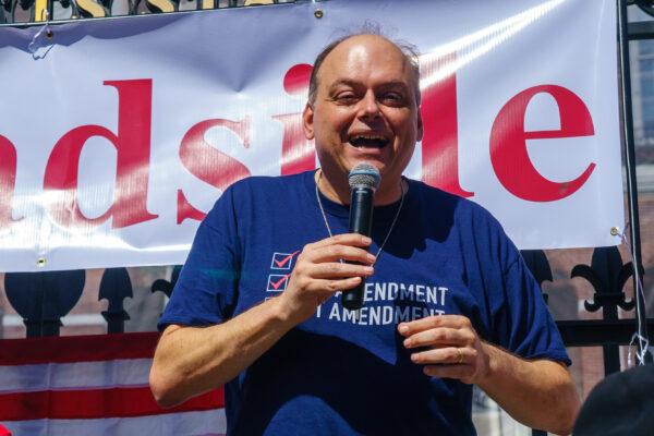 Jeff Kuhner, a well-known radio host, spoke at the rally in front of the Massachusetts State House on Sept. 26. (Learner Liu/The Epoch Times)