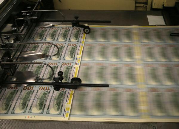 $100 notes are printed at the Bureau of Engraving and Printing in Washington on May 20, 2013. (Mark Wilson/Getty Images)
