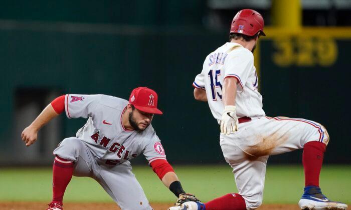 Rookies Lead Rangers Past Angels 5-2 to Avoid 100th Defeat