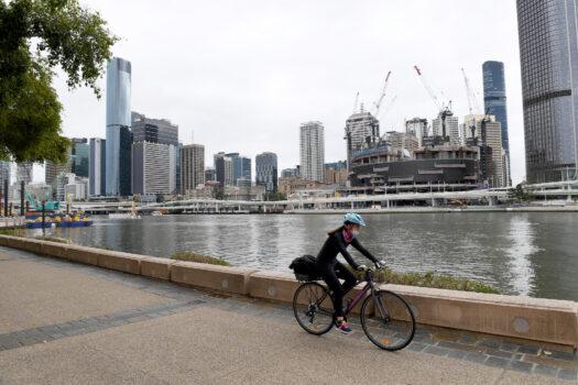 A bike rider is seen wearing his mask in Brisbane, Australia, on Sept. 29, 2021. (Bradley Kanaris/Getty Images)
