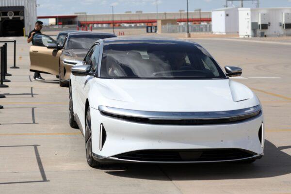 People test drive Dream Edition P and Dream Edition R electric vehicles at the Lucid Motors plant in Casa Grande, Ariz., on Sept. (Caitlin O'Hara/Reuters)