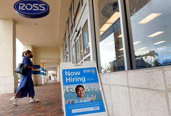 A Now Hiring near the entrance to a Ross department store in Hallandale, Fla., on Sept. 21, 2021. (Joe Raedle/Getty Images)
