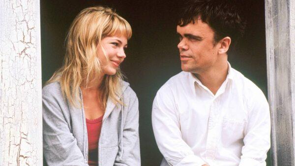 Emily (Michelle Williams) finds a good listener in Finbar (Peter Dinklage). (Miramax Films)