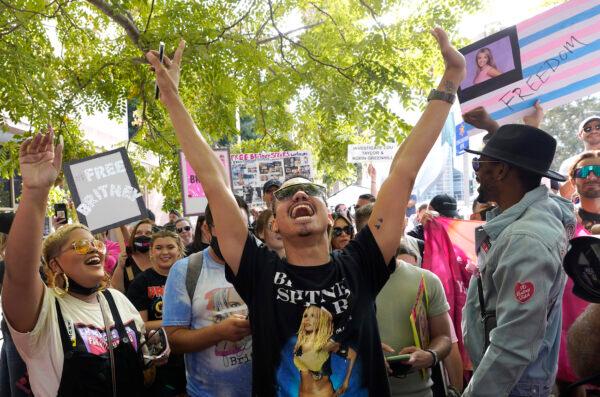 Britney Spears supporters celebrate outside the Stanley Mosk Courthouse in Los Angeles, on Sept. 29, 2021. (AP Photo/Chris Pizzello)