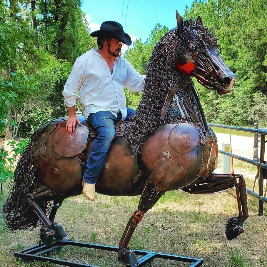 Corby with his horse sculpture. (Courtesy of <a href="https://www.instagram.com/texasmetalcreations/">Corby Skiles</a>)