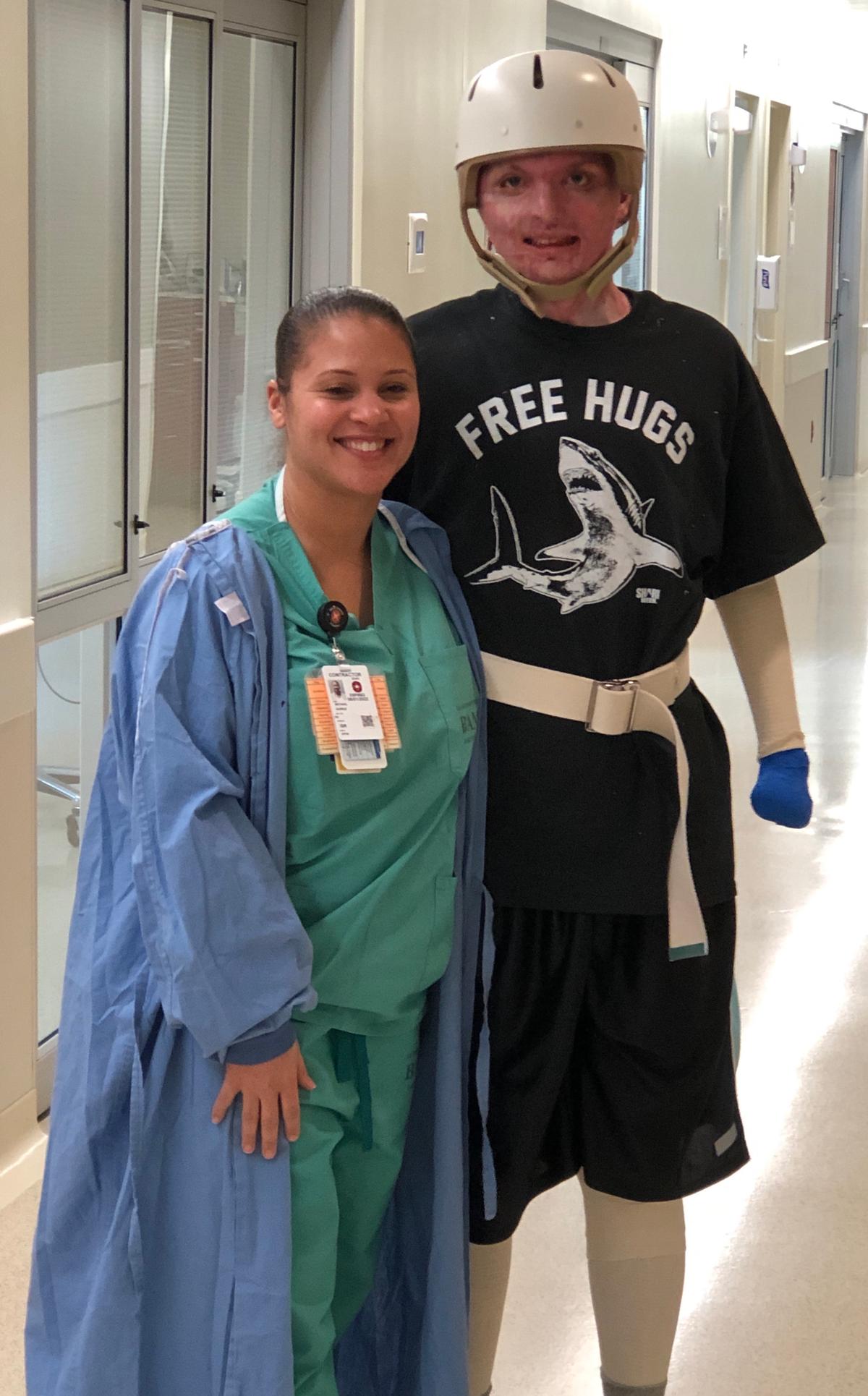 Zach with nurse Mikie Quiroz at the U.S. Army Institute of Surgical Research Burn Center, Brooke Army Medical Center, San Antonio, Texas. (Courtesy of <a href="https://www.instagram.com/zacharyrecovery/">Deona Jo Sutterfield</a>)