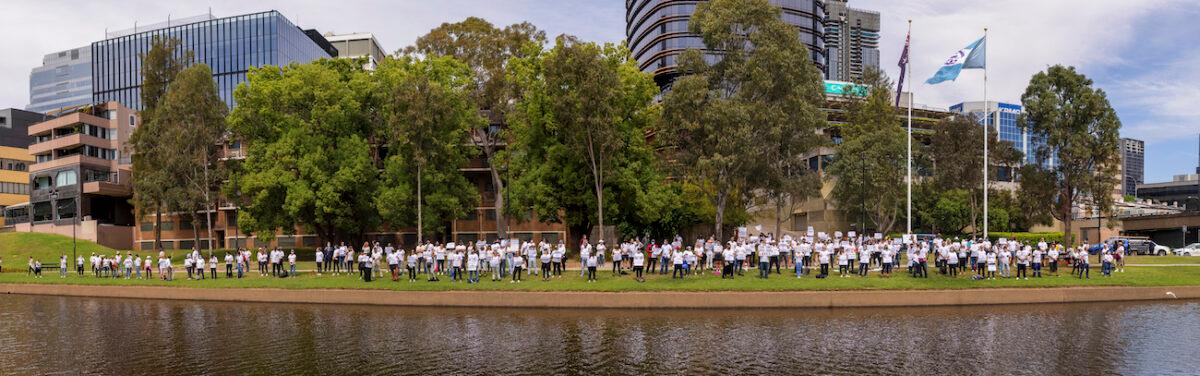 Protesters rallying against mandatory vaccinations gather along the Parramatta River in Sydney, Australia as part of the #ReclaimTheLine protests across the country on Oct. 1, 2021. (Brook Mitchell/Getty Images)
