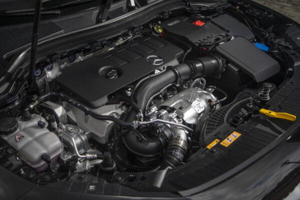Turbo-four under the hood. (Courtesy of Mercedes-Benz)