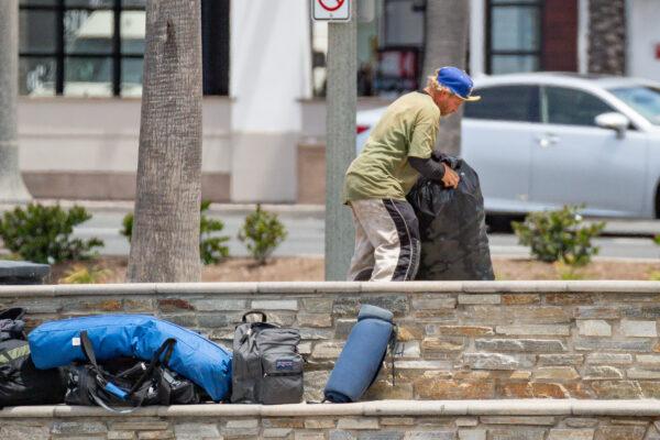A homeless individual in Huntington Beach, Calif., on May 5, 2021. (John Fredricks/The Epoch Times)