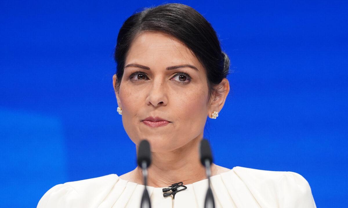 Home Secretary Priti Patel speaks at the Conservative Party Conference in Manchester, England, on Oct. 5, 2021. (Stefan Rousseau/PA)