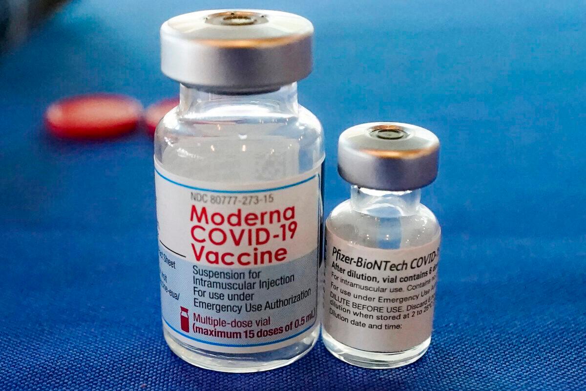 Vials of the Pfizer and Moderna COVID-19 vaccines are seen in Jackson, Miss., on Sept. 21, 2021. (Rogelio V. Solis/AP Photo)