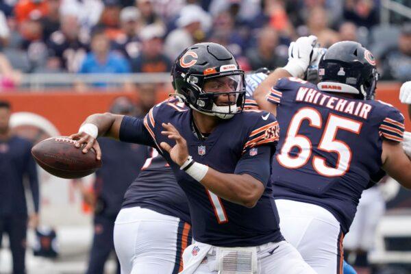 Chicago Bears quarterback Justin Fields passes during the first half of an NFL football game against the Detroit Lions Sunday, Oct. 3, 2021, in Chicago. (David Banks/AP Photo)