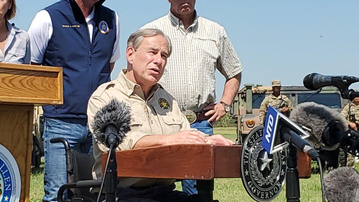 Texas Gov. Greg Abbott speaks at a press conference about the border situation while other governors look on in Mission, Texas, on Oct. 6, 2021. (Marina Fatina/NTD)