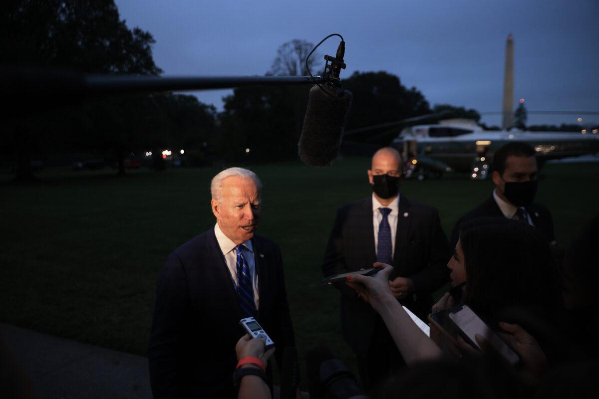 President Joe Biden briefly speaks to reporters about his Build Back Better legislation and Taiwan after returning to the White House in Washington, on Oct. 5, 2021. (Chip Somodevilla/Getty Images)