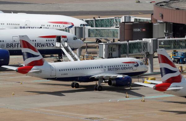 British Airways aircraft are parked at the South Terminal at Gatwick Airport, in Crawley, United Kingdom, on Aug. 25, 2021. (Peter Nicholls/Reuters)