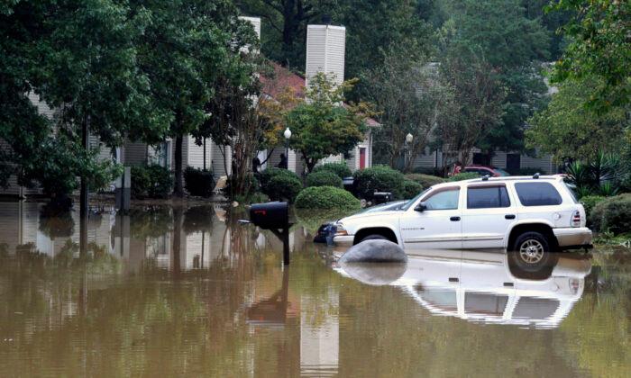Alabama Swamped, 2 Killed in Floods From Slow-Moving Front