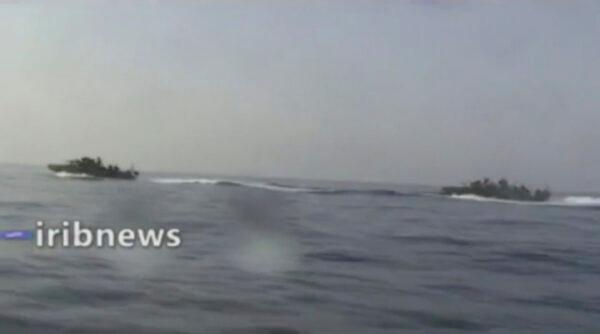 This frame grab from video aired by state-run TV Islamic Republic of Iran Broadcasting (IRIB) on Oct. 7, 2021, shows two vessels in the Persian Gulf. (IRIB via AP)