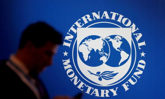 Accelerate Tapering of Asset Purchases and Tighten Monetary Policy: IMF