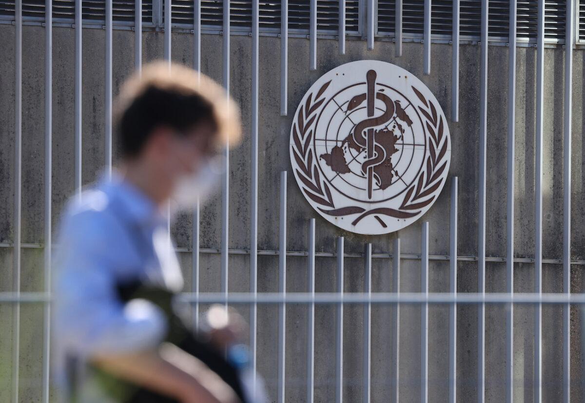 A man enters the headquarters of the World Health Organization in Geneva, Switzerland, on June 15, 2021. (Sean Gallup/Getty Images)
