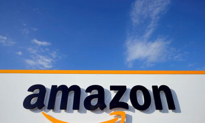 Amazon Sued by Warehouse Workers Over COVID-19 Screening Pay