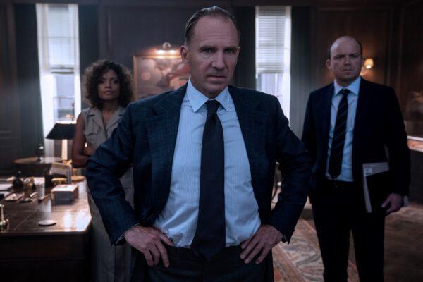 Ralph Fiennes (C) plays MI6 executive M as mirthless. (MGM and EON Productions)