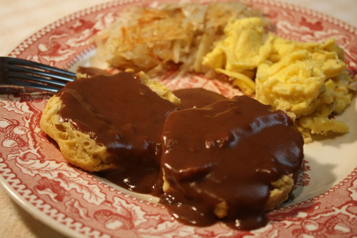 Biscuits with chocolate pudding, cooked in a skillet, served with scrambled eggs and fried potatoes. (Courtesy of Lanie Montgomery)
