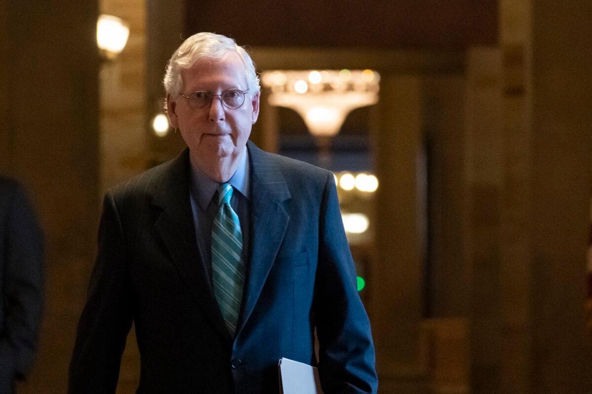 Senate Minority Leader Mitch McConnell (R-Ky.) leaves the Senate chamber after speaking, at the U.S. Capitol in Washington on Oct. 7, 2021. (Alex Brandon/AP Photo)