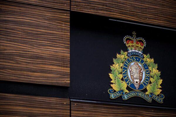  The RCMP logo is seen outside Royal Canadian Mounted Police "E" Division Headquarters in Surrey, B.C., in a file photo. (The Canadian Press/Darryl Dyck)