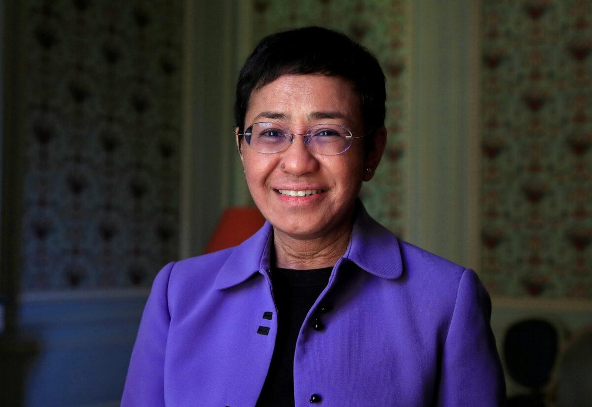 Maria Ressa, journalist and CEO of the Rappler news website, poses before a news conference to launch a commission to draft an "International Declaration on Information and Democracy" hold by Human rights group Reporters Without Borders in Paris, France, on Sept. 11, 2018. (Gonzalo Fuentes/File Photo/Reuters)
