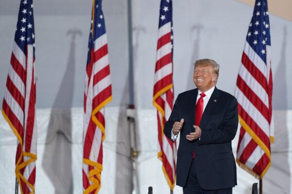 Former President Donald Trump greets the crowd at a Sept. 25, 2021 rally in Perry, Ga. for Republican Senate candidate Herschel Walker, Secretary of State candidate Rep. Jody Hice (R-Ga.), and candidate for Lieutenant Governor, State Sen. Burt Jones. (Sean Rayford/Getty Images)