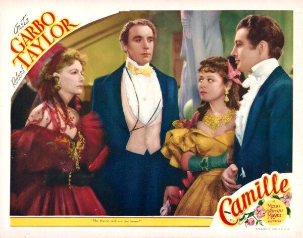 (L–R) Greta Garbo, Henry Daniell, Lenore Ulric, and Robert Taylor appear in a lobby card for the MGM release “Camile.” (Public Domain)