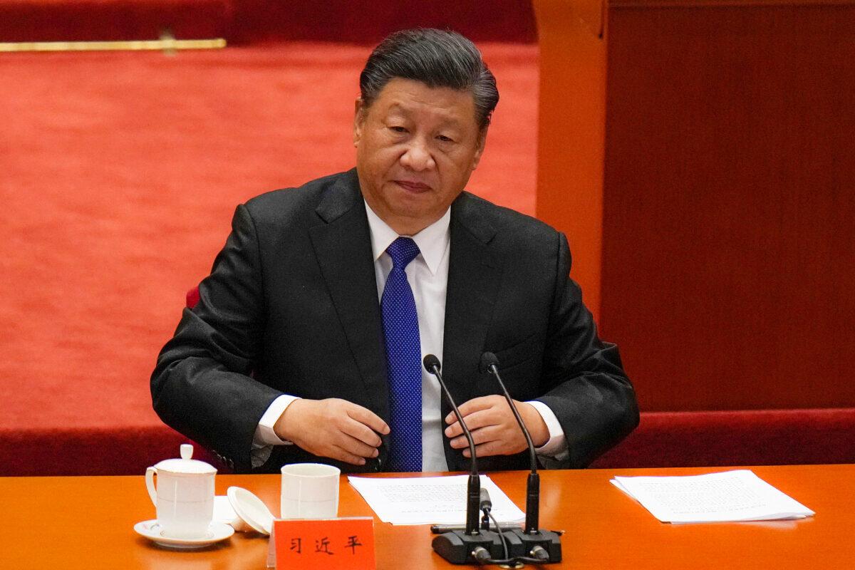 Chinese leader Xi Jinping arrives at an event commemorating the 110th anniversary of the Xinhai Revolution at the Great Hall of the People in Beijing on Oct. 9, 2021. (Andy Wong/AP Photo)