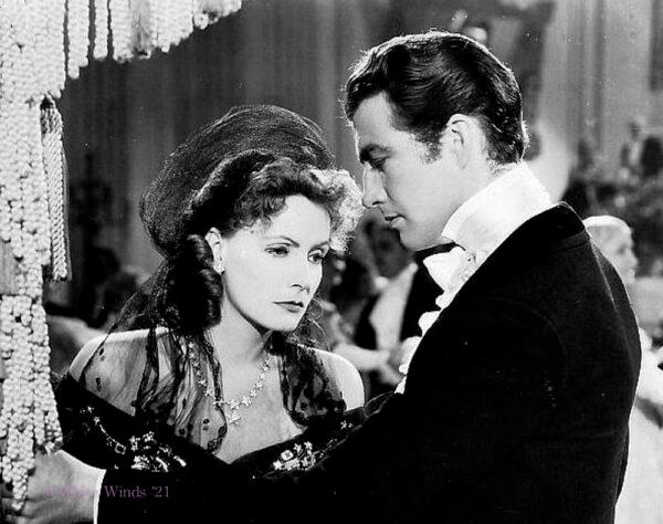 Camille (Greta Garbo) relinquishes the love of her life, Armand (Robert Taylor), for his sake. (Public Domain)