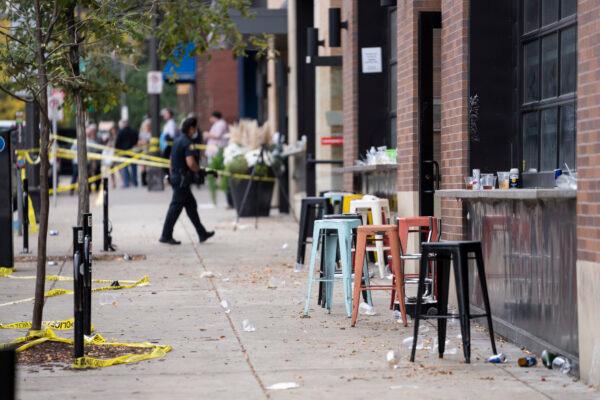 Investigators processed the chaotic scene of a multiple shooting at the bar Truck Park in St. Paul, Minn., that happened after midnight, on Oct. 10, 2021. (Renee Jones Schneider/Star Tribune via AP)