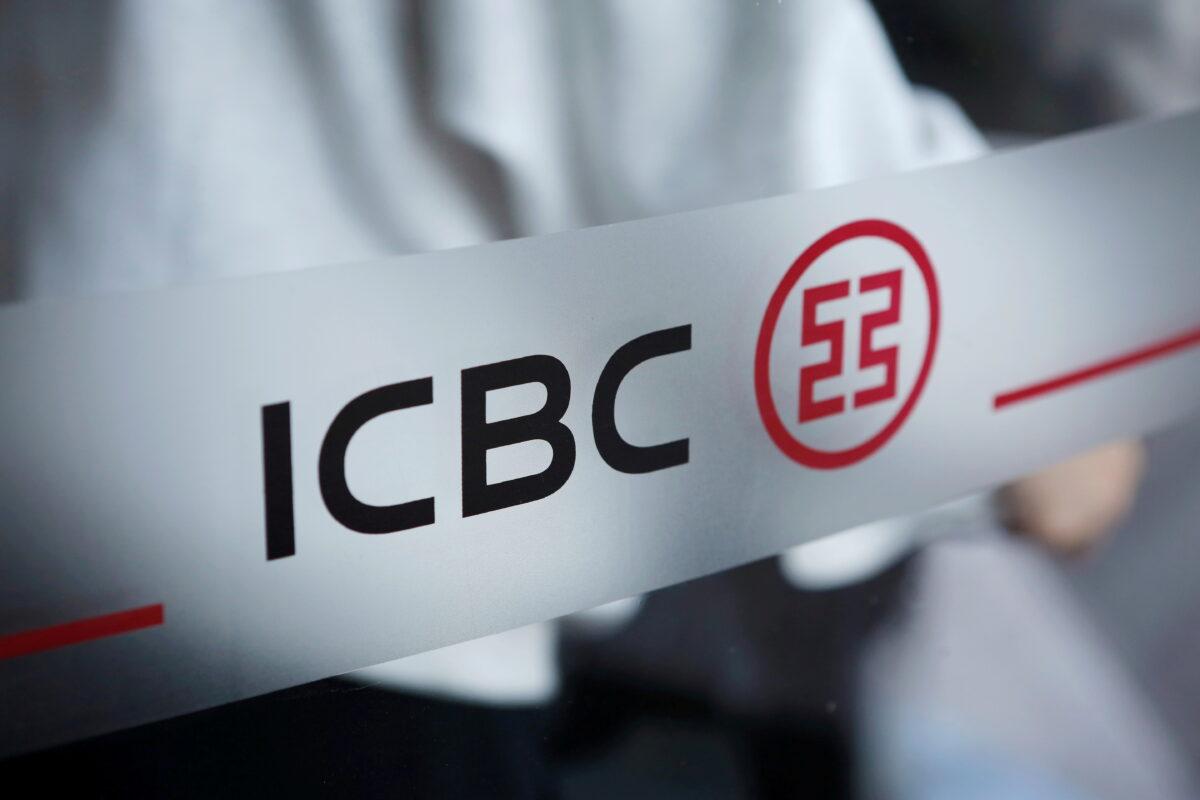 The logo of the Industrial and Commercial Bank of China at the entrance to its branch in Beijing on April 1, 2019. (Florence Lo/Reuters)