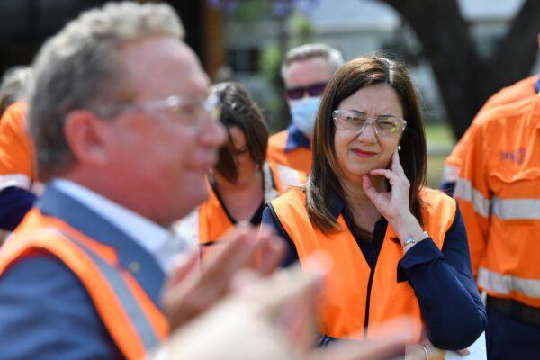 Queensland Premier Annastacia Palaszczuk (right) and Andrew Forrest (left) from Fortescue Future Industries talk to the media during a hydrogen announcement at Incitec Pivot on Gibson Island in Brisbane, Australia, on Oct. 11, 2021. (AAP Image/Darren England)