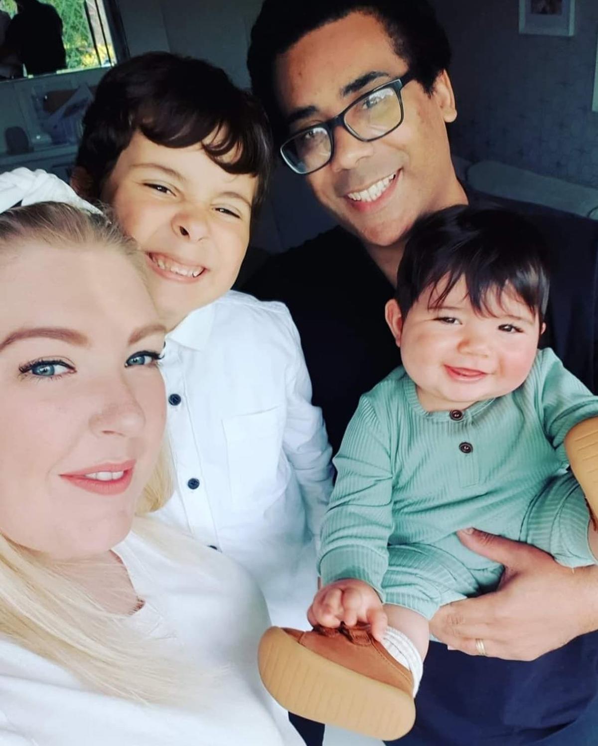 Vicky and her husband, Simon, with their two sons, Roman and baby Reign. (Courtesy of Caters News)