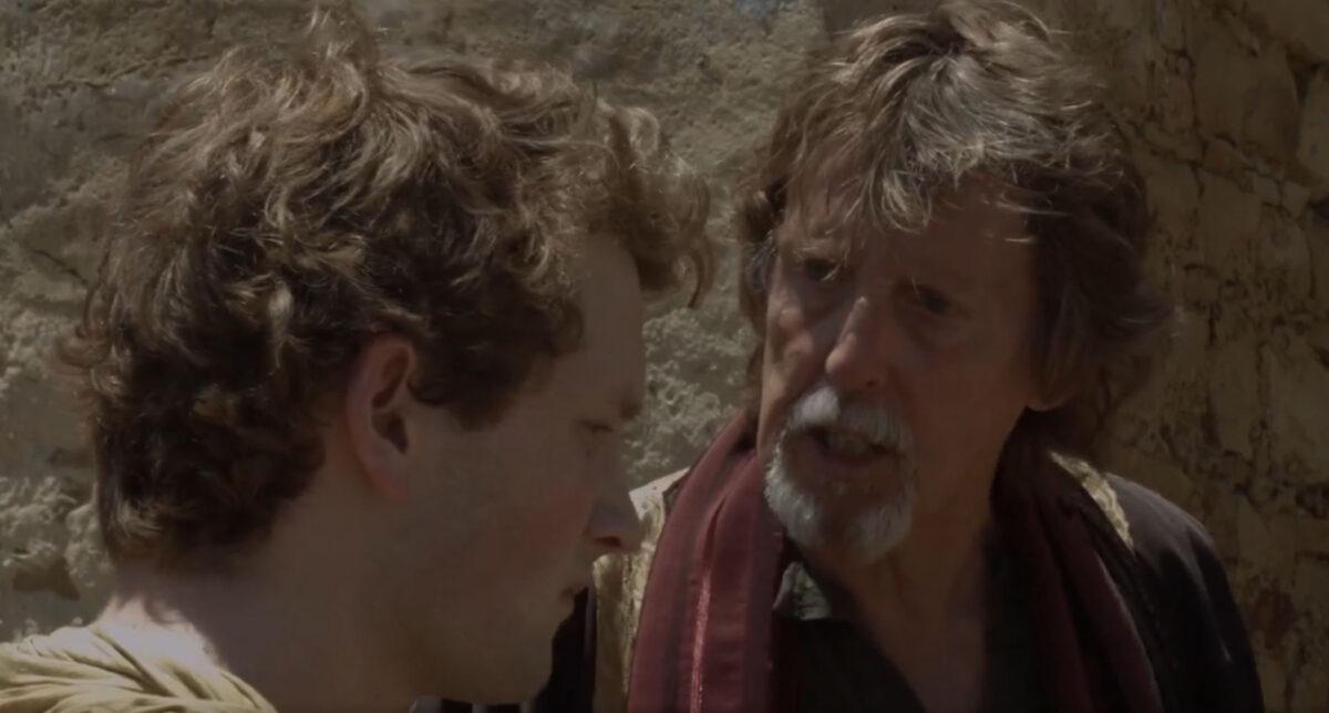 King Saul (Paul Hughes, R) tries to dissuade David (Miles Sloman) from fighting Goliath in “David and Goliath.” (RiverRain Productions)