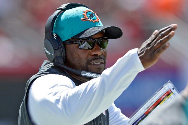 Former Miami Dolphins head coach Brian Flores calls a play against the Tampa Bay Buccaneers during the first half of an NFL football game on Sunday, Oct. 10, 2021, in Tampa, Fla. (Jason Behnken/AP Photo)