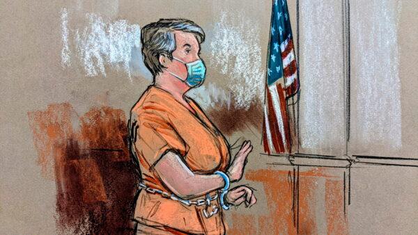 Diana Toebbe appears in this courtroom sketch for her first court hearing on charges that she and her husband, former U.S. Navy engineer Jonathan Toebbe, attempted to sell secrets about nuclear submarines to a foreign power in exchange for cryptocurrency, at a courthouse in Martinsburg, West Virginia, on Oct. 12, 2021. (Bill Hennessey/Reuters)