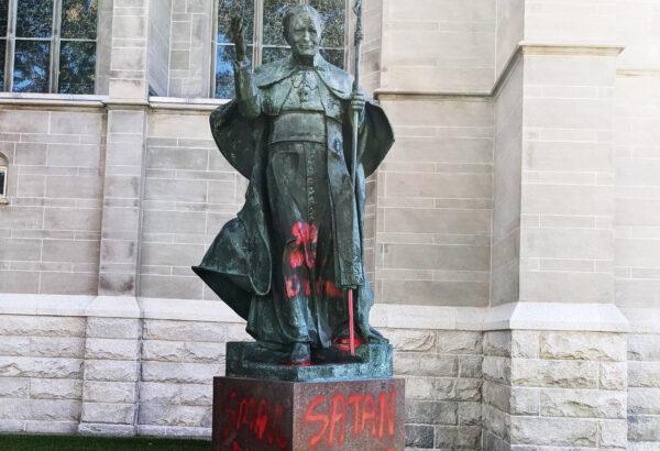 A statue of Pope John Paul II was also spray-painted in the attack that occurred just before Sunday Mass on Oct. 10 in Denver. (Photo by the Rev. Samuel Morehead)