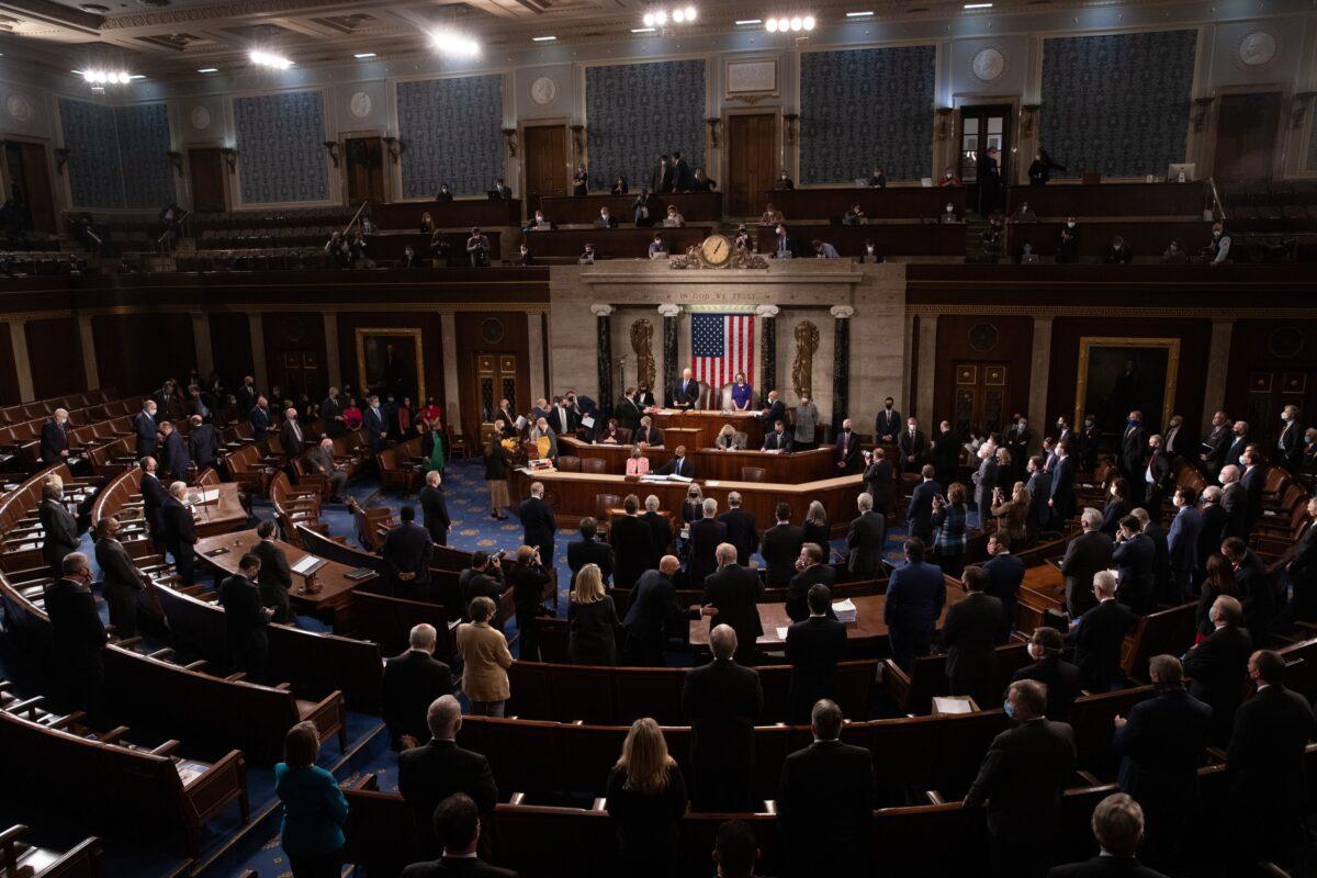 The House floor convenes before a joint session of the House and Senate convenes to confirm the Electoral College votes cast in November's election, at the Capitol in Washington, D.C., on Jan. 6, 2021. (Graeme Jennings/Pool/AFP via Getty Images)