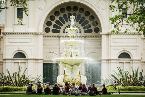 People enjoy a picnic in Carlton Gardens in Melbourne, Australia, on Oct. 9, 2021. (Darrian Traynor/Getty Images)