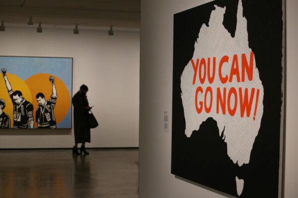 A person takes in the work of artist Richard Bell at the MCA (Museum of Contemporary Art Australia) in Sydney, Australia, on Oct. 12, 2021. (Lisa Maree Williams/Getty Images)