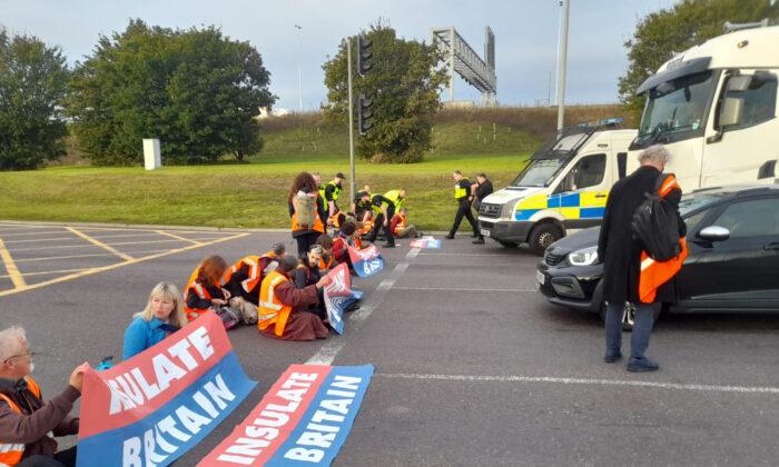 UK Climate Protesters Dragged Off Roads by Angry Motorists
