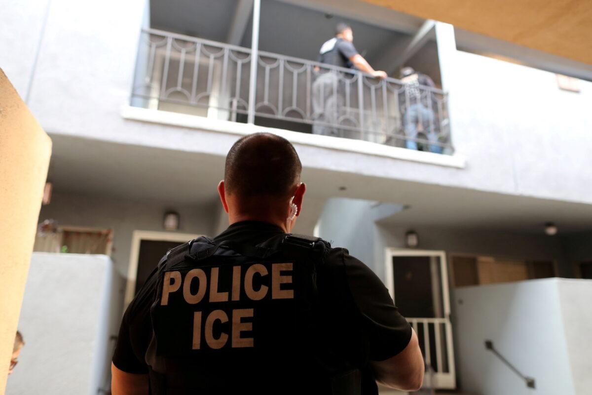 A U.S. Immigration and Customs Enforcement agent stands in Hawthorne, Calif., on March 1, 2020. (Lucy Nicholson/Reuters)