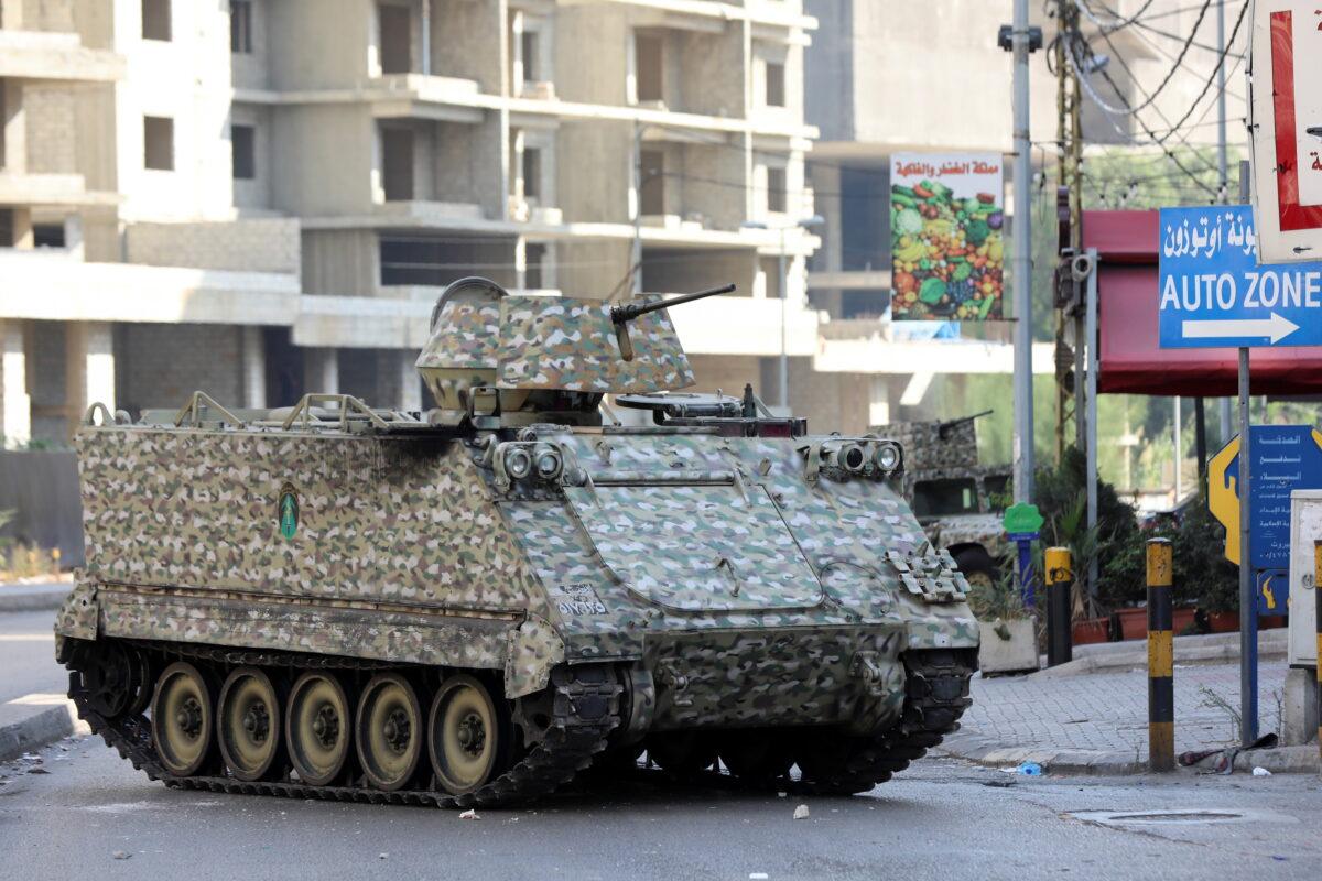 A tank is seen after gunfire erupted, in Beirut, Lebanon, on Oct. 14, 2021. (Mohamed Azakir/Reuters)